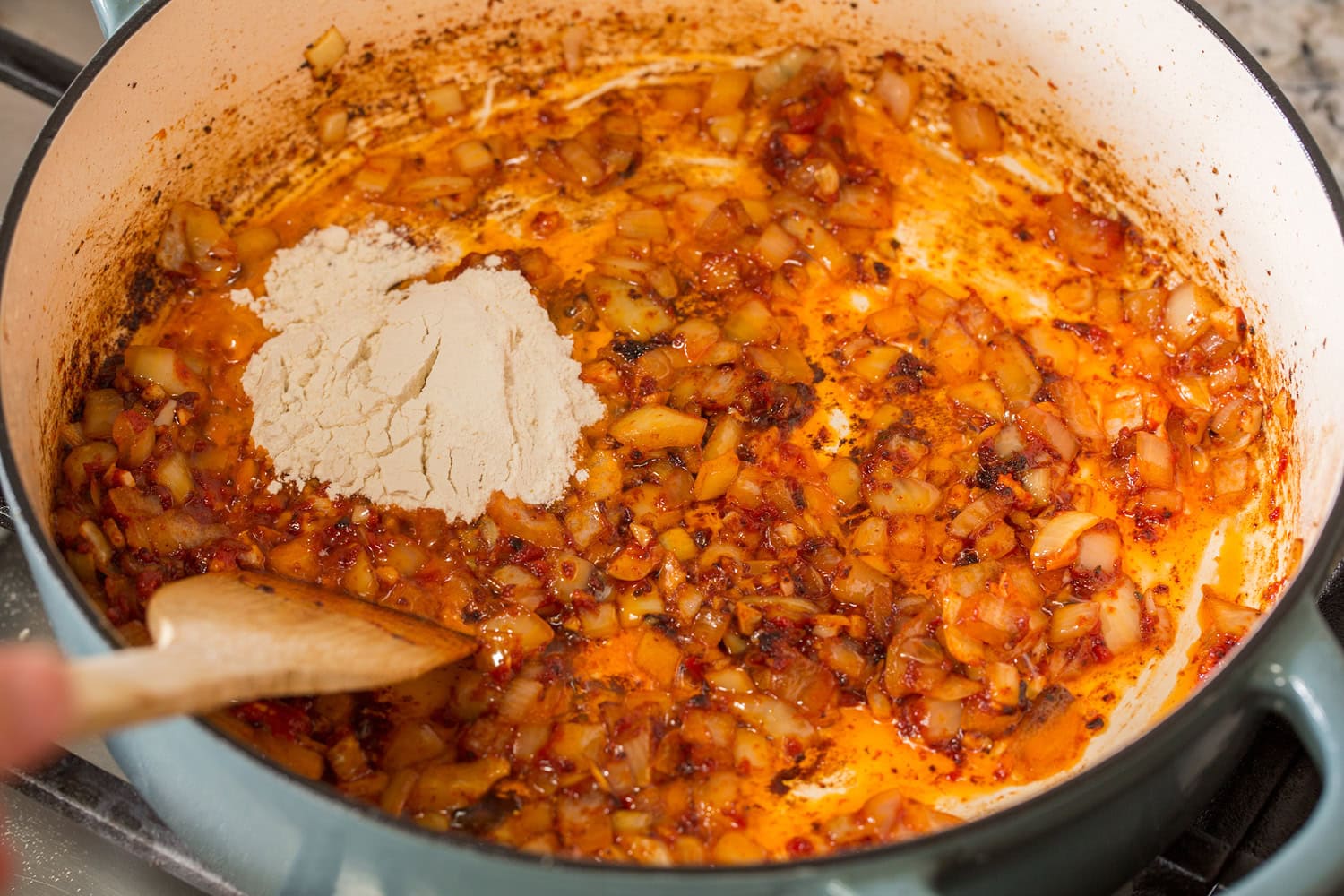 Beef Bourguignon Flour added to aromatics.