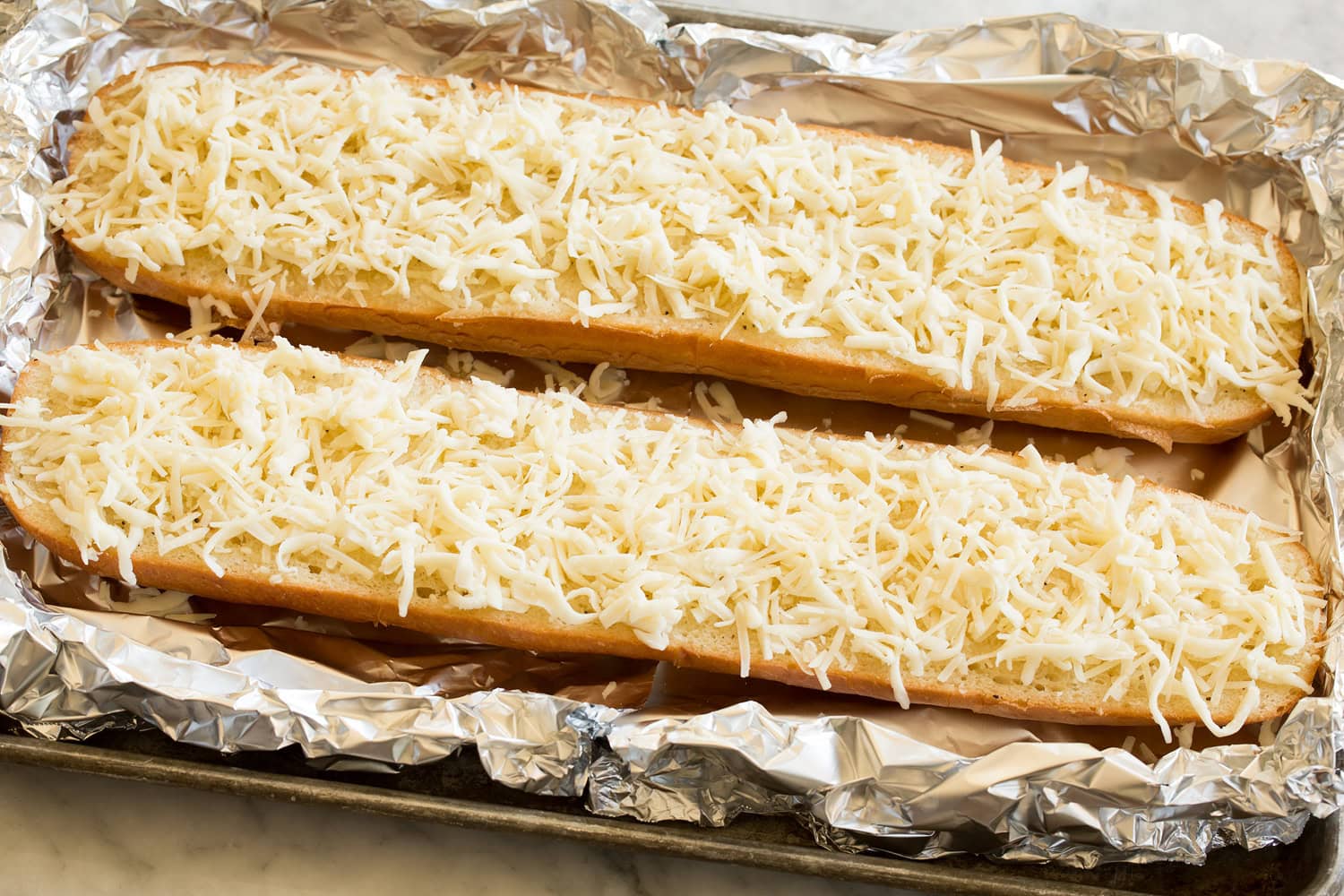 Cheesy Garlic Bread Cheese added to french bread halves.
