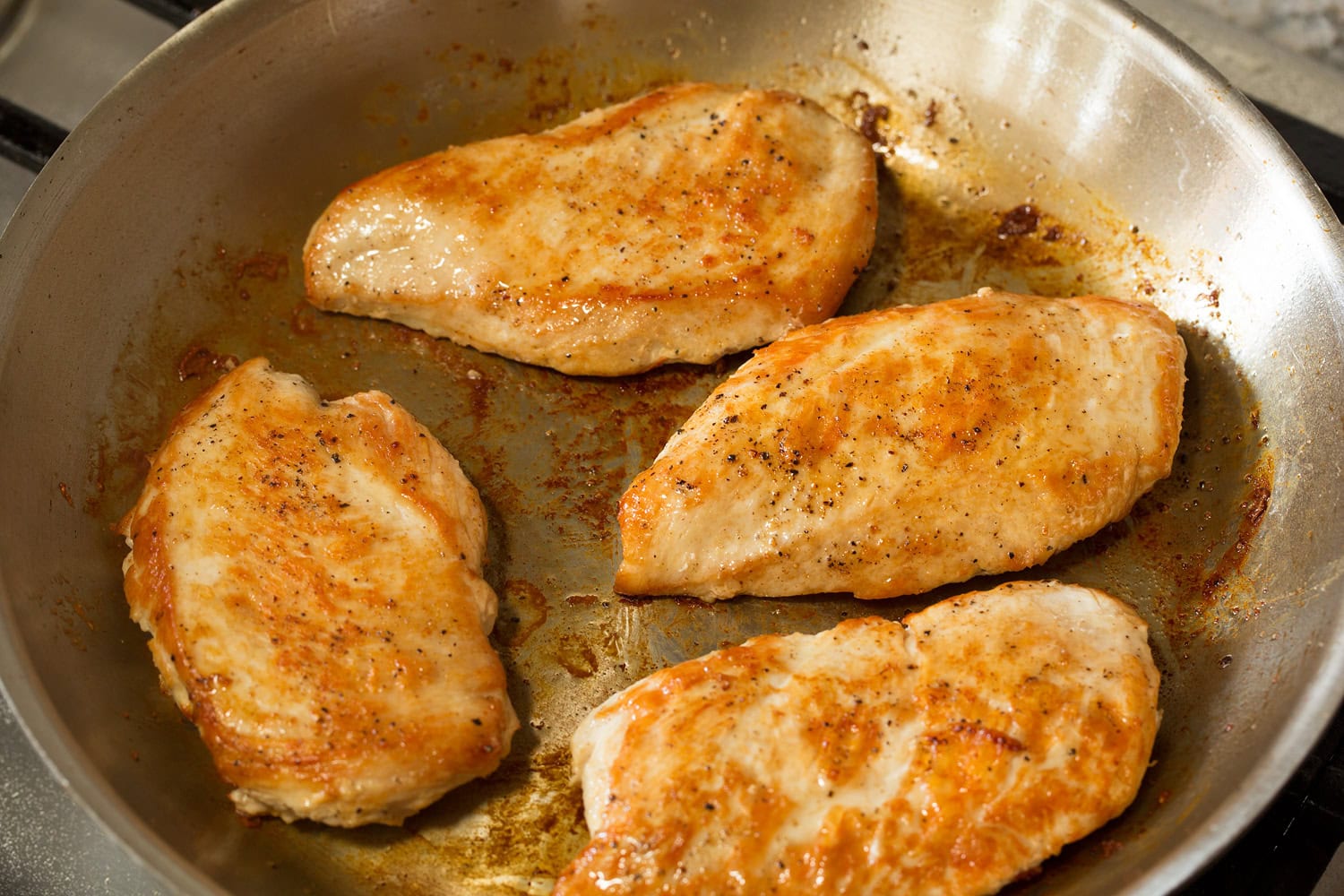 Creamy Dijon Mustard Chicken Pan seared chicken breasts that are golden brown.