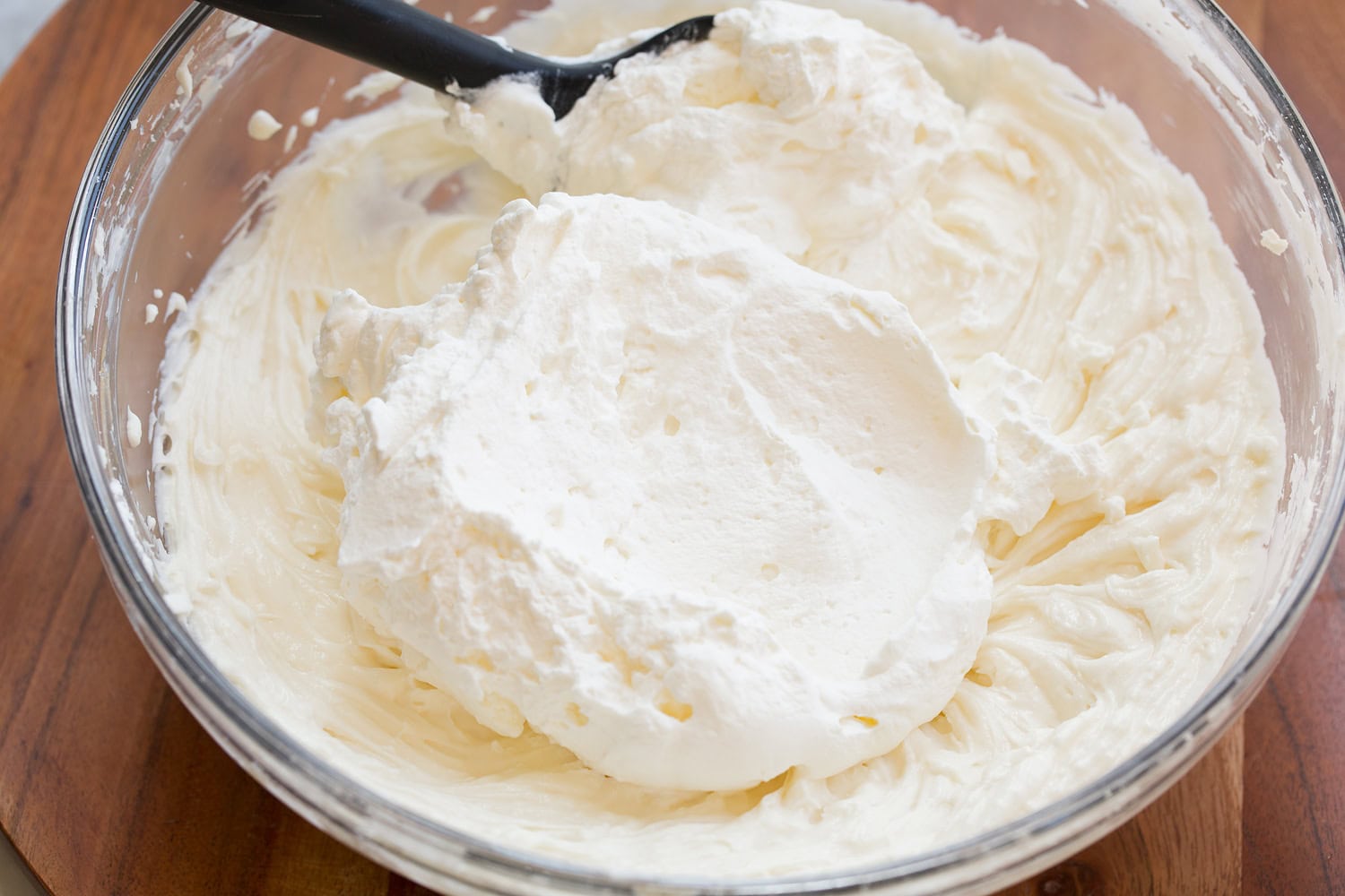 No Bake Cheesecake Whipped cream added to cream cheese mixture.