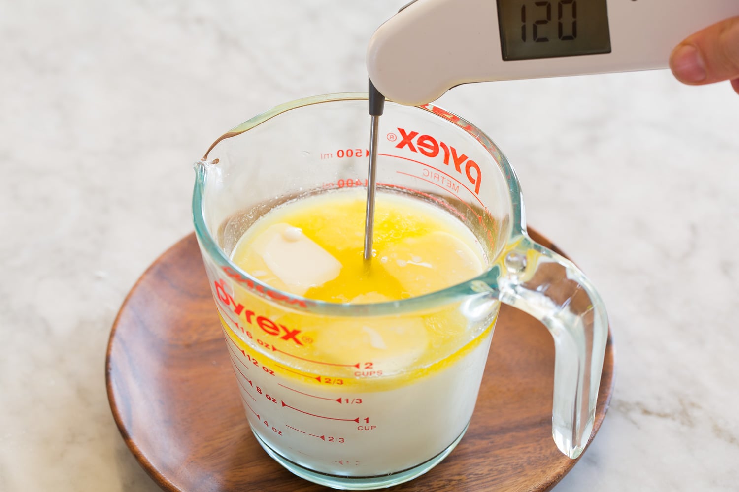 One Hour Dinner Rolls Heated liquid for roll dough.