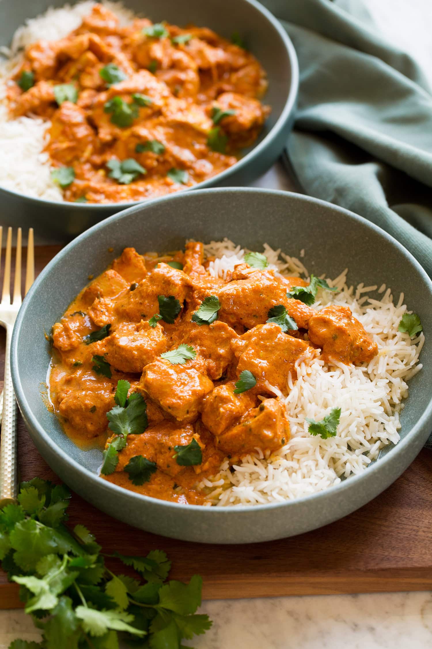 Slow Cooker Chicken Tikka Masala Slow cooker chicken tikka masala served with rice.
