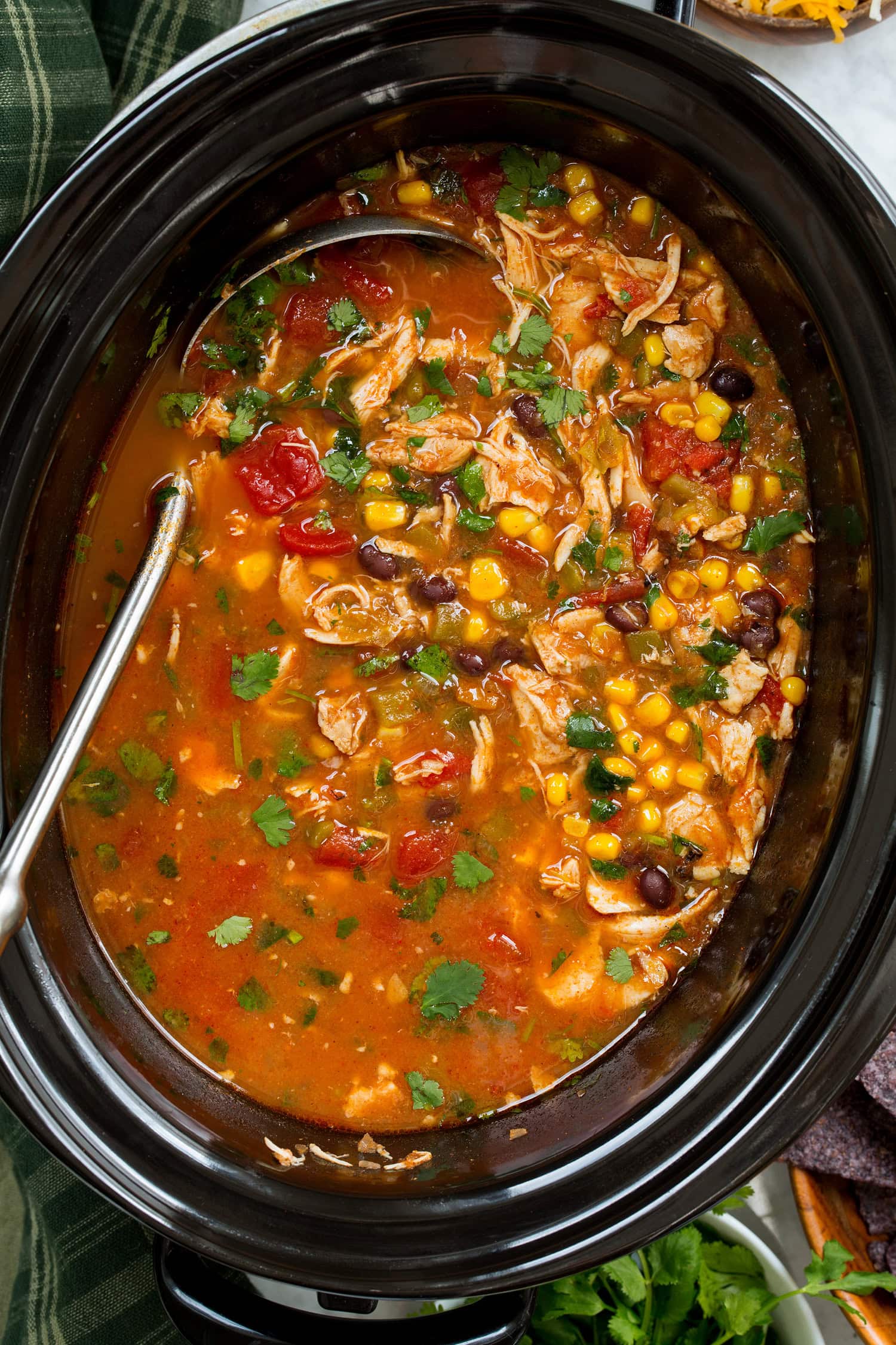 Slow Cooker Chicken Tortilla Soup Completed chicken tortilla soup in crockpot.