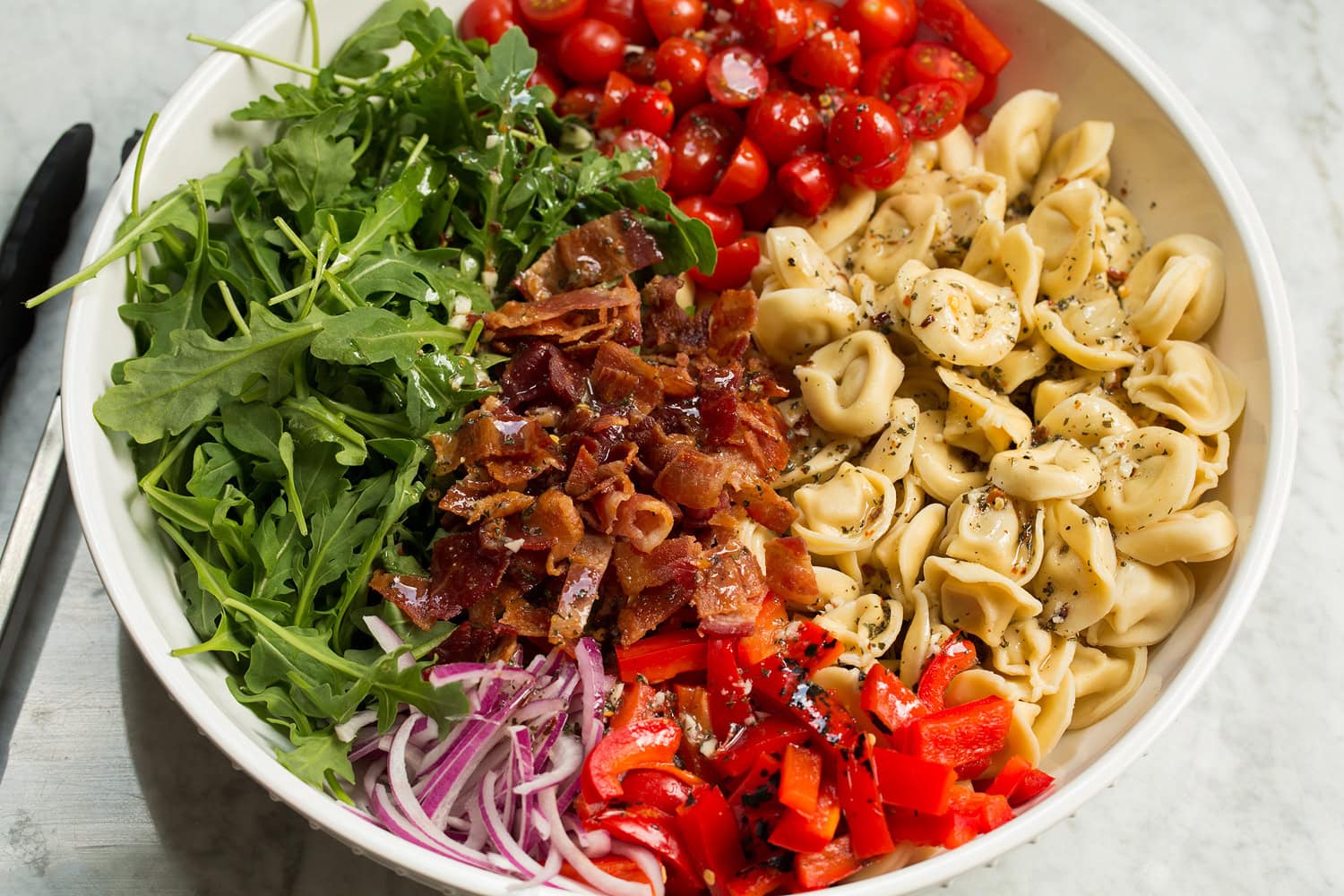 Tortellini Pasta Salad Ingredients for pasta salad shown before tossing.