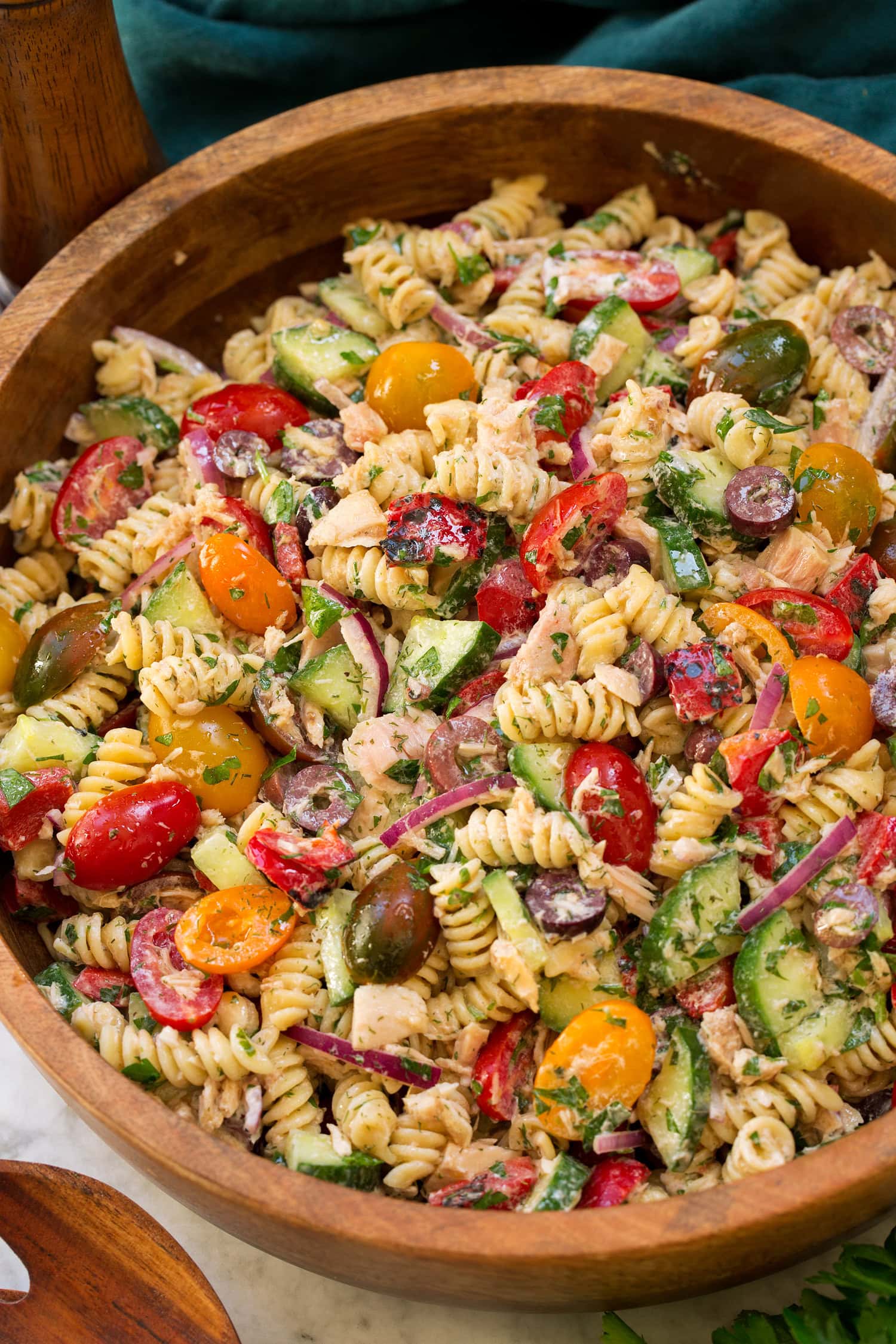 Tuna Pasta Salad Rotini pasta salad with Mediterranean style fresh vegetables, herbs and tuna.